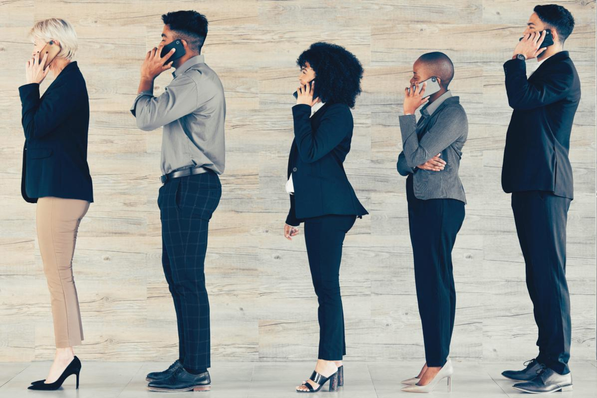 Businespeople talking on phone.