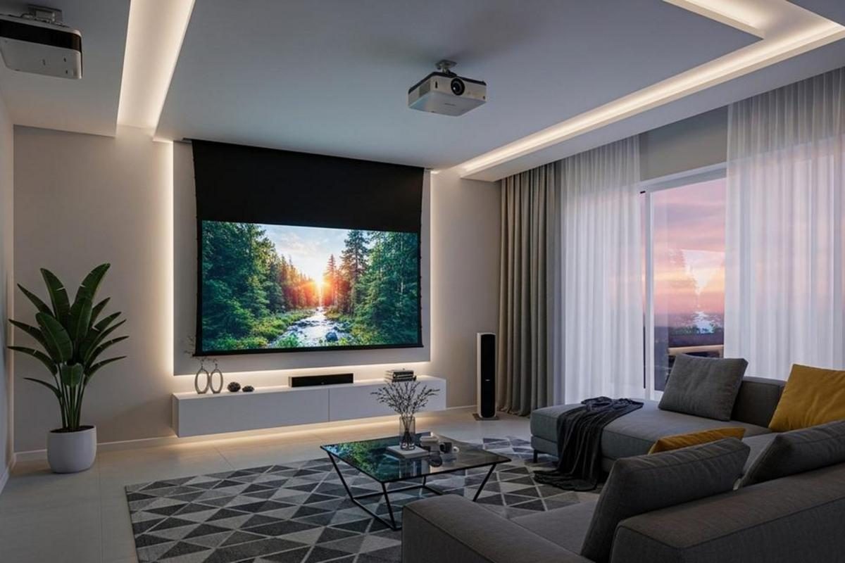Living room with a ceiling-mounted projector, retractable projection screen, and speaker