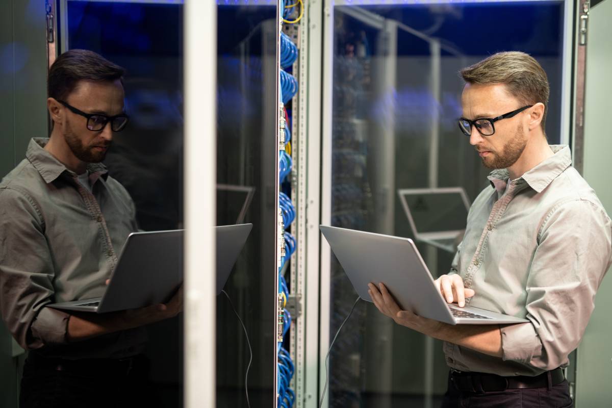 Man working in server room